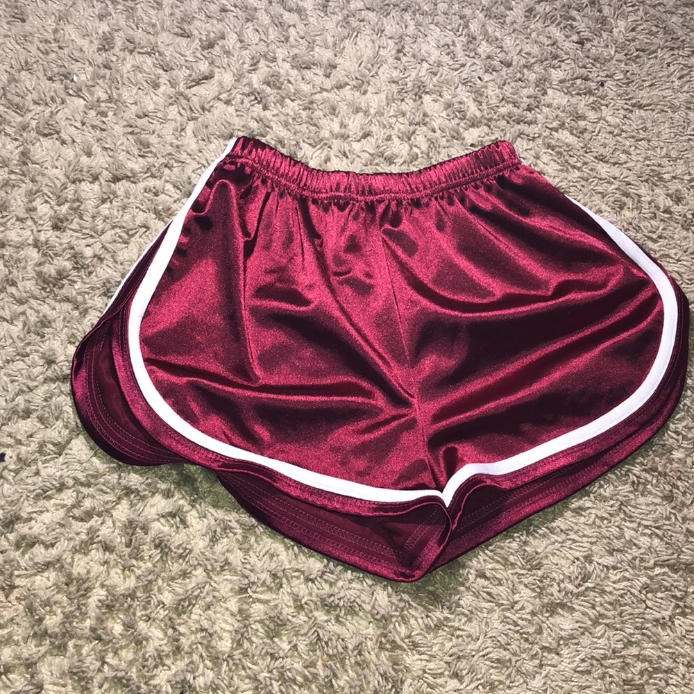 Red shorts with white stripes